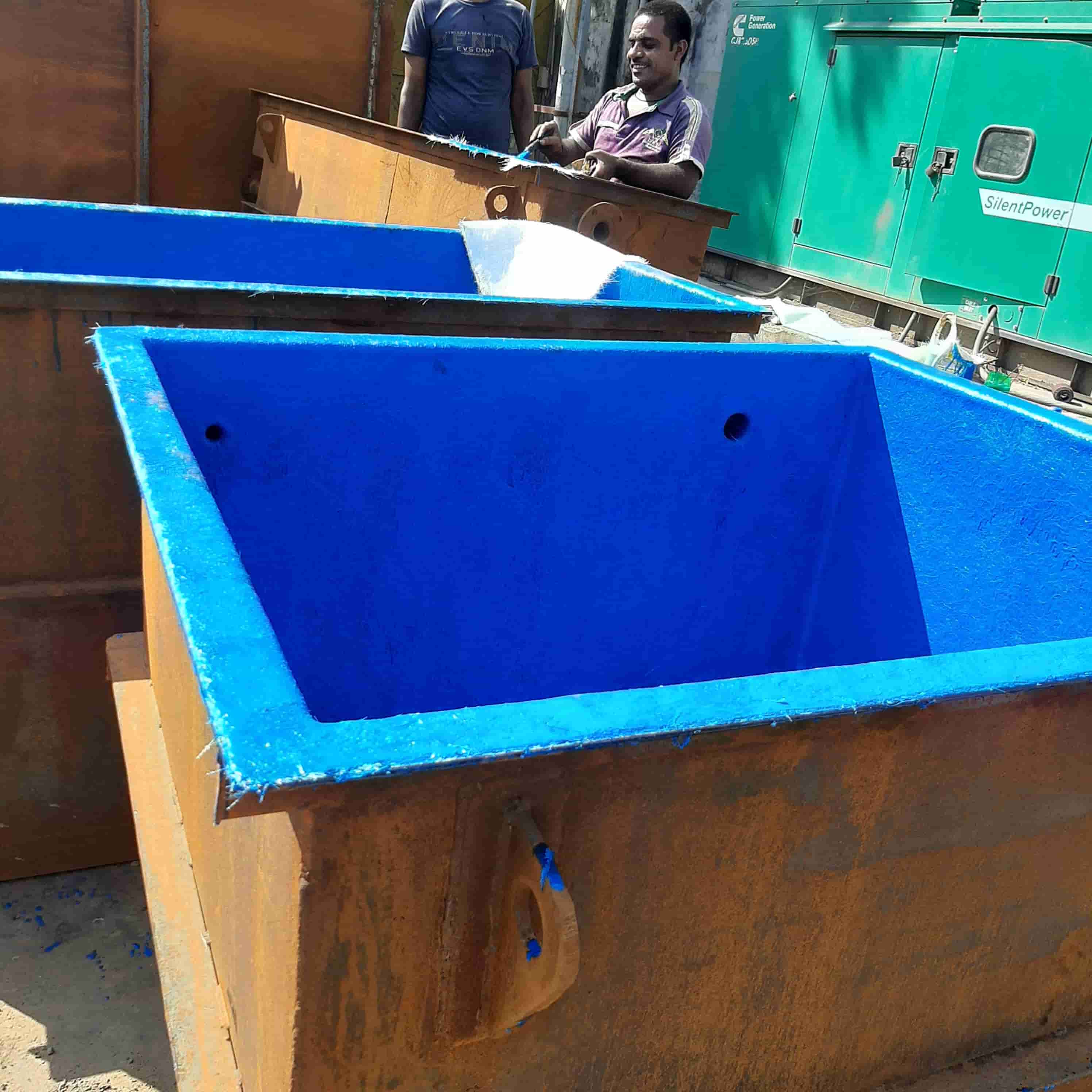 Worker applying Chemical Resistant FRP Coating
